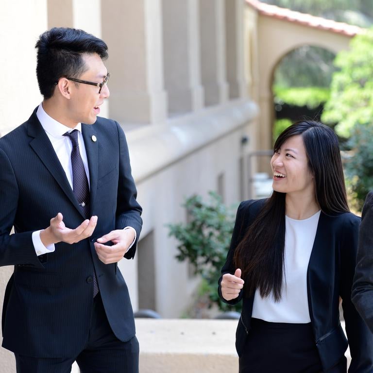 Business, two students talking
